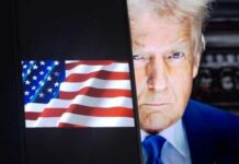 Donald Trump face beside a display of the American flag