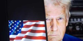 Donald Trump face beside a display of the American flag