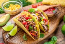 Ground beef portions on a wooden board