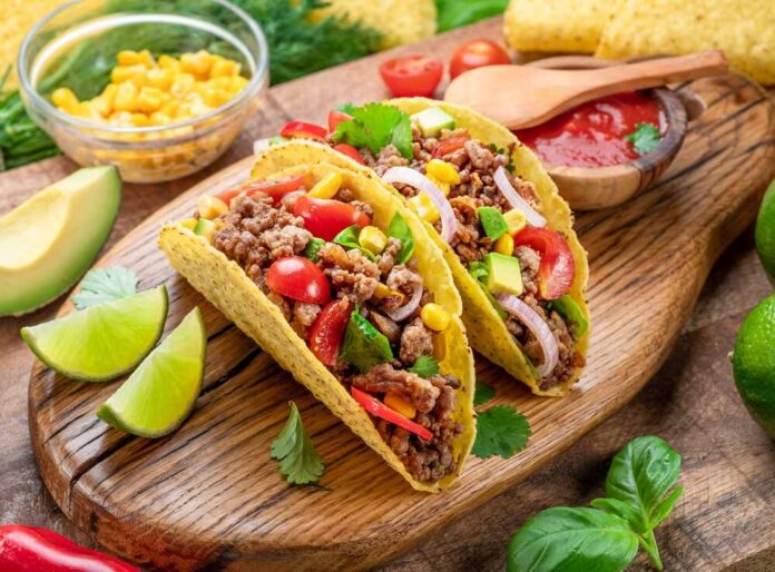 Ground beef portions on a wooden board